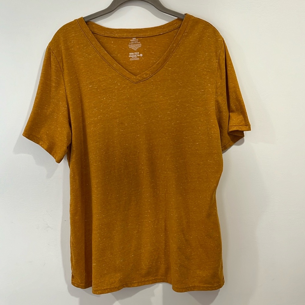 Gold colored top made to fit a size large